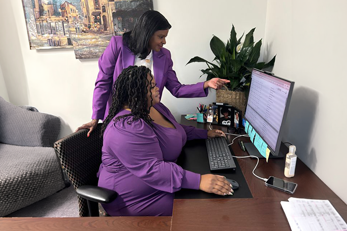 Photo Of Chatyra Harper-Coleman and Daniele C. Johnson